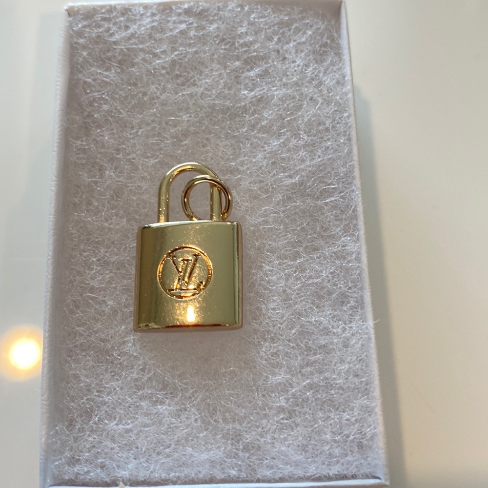 Authentic Louis Vuitton Lock pendant charm